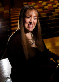 Music faculty and director of keyboard studies Vanessa Cornett-Murtada poses for a portrait July 8, 2013 in the Brady Education Center auditorium. Cornett-Murtada was photographed for the Grants and Research Office's Exemplars publication which will highlight her research work with performance anxiety in musicians.